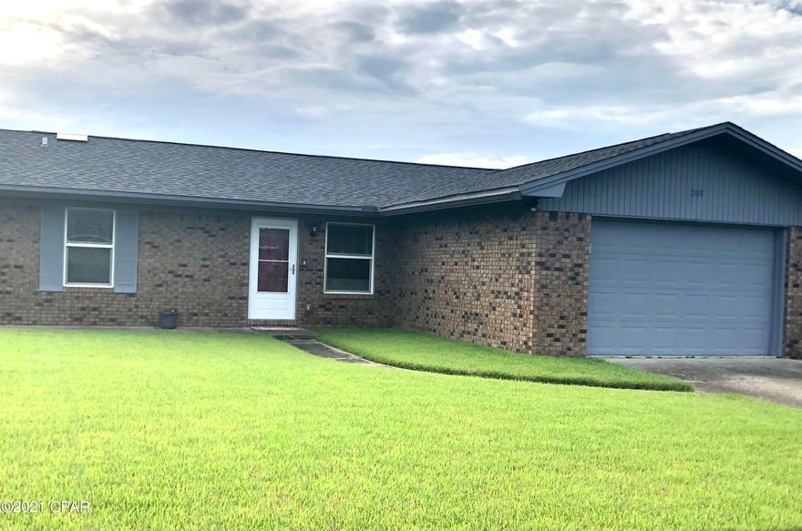 Like NEW NEW NEW, completely rebuilt after Hurricane Michael! Boasts spray foam insulation in walls and attic, vinyl plank flooring, quartz countertops, beautiful, dark kitchen cabinets, all brand-new stainless steel LG appliances, 2019 hot water heater, 2019 HVAC, all new windows, and all LED lights in the home. Very energy efficient!  Includes an office space/den area for those who need that extra space! Has a covered back patio space for entertainment with solar shade included for those bright days. Irrigation/Sprinkler system on well, main source is public/sewer.  Even comes with a transferrable Rhino Shield warranty that must be done within 30 days of sale.  Room sizes and sq footage have not been measured by agent, if important, please verify.