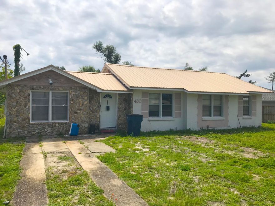 SUPER fix & flip or investment opportunity with this 4 Bedroom / 1 Bath home IN THE COVE in Panama City! Located in one of the most desirable neighborhoods in Panama City (THE COVE) this home is 1,438 sqft. (heated) and 1,558 sqft. (total). The home has a METAL ROOF which is in good condition and does not need to be replaced, and there is also a screened-in lanai in the back. All utilities are currently on and working, so this property is LIVABLE currently - It just needs a cosmetic rehab, as you can see from the photos. At this price, this property is a STEAL and it WON'T LAST LONG! So act quickly! --- PROPERTY IS OCCUPIED, NO TRESPASSING --- CASH BUYERS ONLY ---