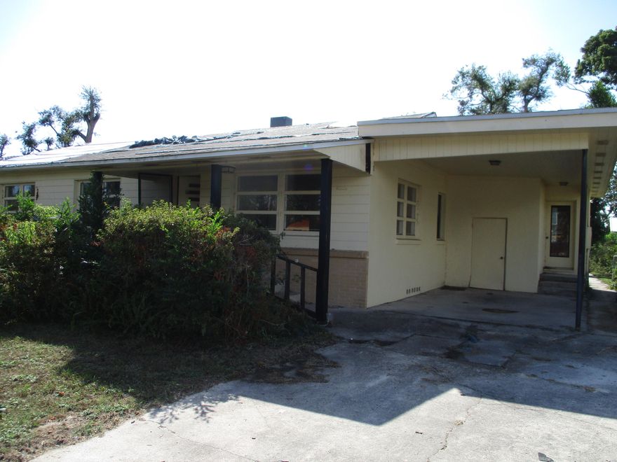 'CURRENTLY UNDER CONTRACT, SELLER ACCEPTING BACKUP OFFERS' ---  INVESTOR SPECIAL!!!  This is a house for remodeling.  The roof over the two end bedrooms has been damaged by Hurricane Michael and needs rebuilding.  The rest of the home appears good except the family room has an area that needs repair.  This floor plan is ideal for opening up the kitchen to the large living area.  There are Oak hardwood floor under the carpet.  There is so much potential here for the wise flipper or investor.  The home is vacant and on code box. All offers considered.  Due to the condition of the property this will need to be a cash transaction or some kind of repair loan.