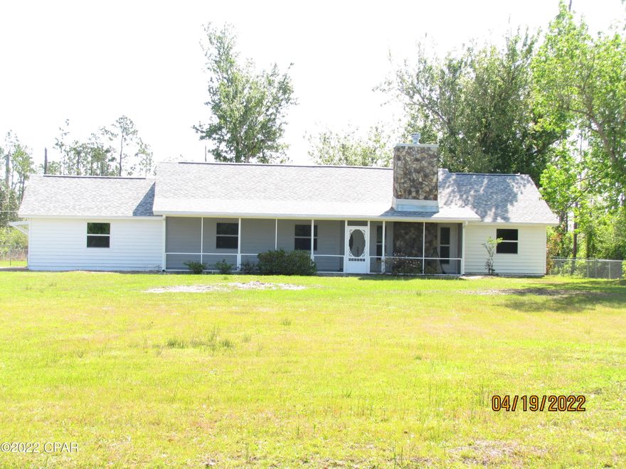 Looking for a place to get away from it all but still be close to town?  Then look no further, this lovely home is nestled amongst the trees on 3.924 acres.  If you love seclusion or want to raise some animals, including horses – this might just be the place for you.  After Hurricane Michael, the roof was replaced, all windows and doors were replaced, new inside and outside HVAC.  The exterior of the home is Pine lap siding. Front screened porch.  Spacious 15 X 15 back porch with indoor outdoor carpet and vinyl windows.  Adjacent to a 45 X 15 covered awning walkway.  The home consists of a sunken living room with stone wood burning fireplace accented by vaulted ceiling with wood beam.  3 Bedrooms, 2 full baths in addition to a bonus room and non A/C rec room, finished but just needs some flooring.   Multiple fenced in areas with additional land not encumbered at this time.  2 car detached garage with a 15 X 20 lien to attached.  Electric gate at drive entrance.  Separate irrigation meter for watering.  Home is wired for a generator.  Water softening system that is owned by the seller, but now that the house is on Callaway water and sewer, can be disconnected.  Call your favorite Realtor today and make an appointment to see this lovely property before it's gone.