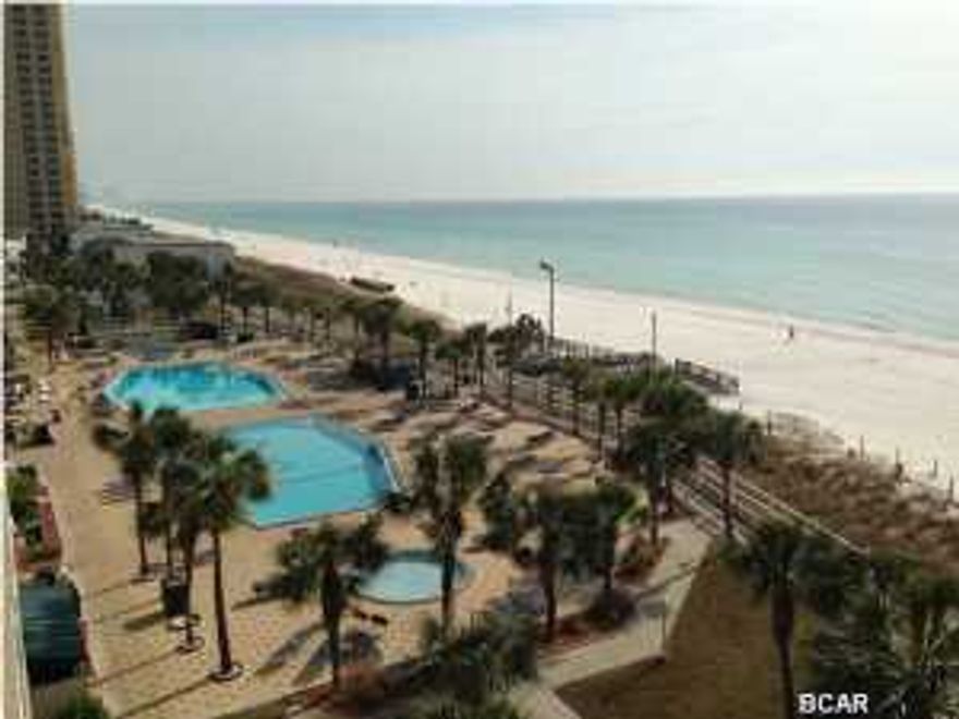 Gulf front with great views of the white sandy beaches, emerald green waters, and amazing sunsets. This gated community offers lots of amenities: Gulf side Tiki Bar, Playground for the kids, restaurant, 2 pools (1 heated in the winter months), 2 kiddie pools, 2 hot tubs, sauna and fitness center, game room, tennis and shuffle board, and an on site gift shop. This condo would make a great vacation getaway or rental investment. Including the bunk-type beds in the hallway and sofa sleeper you can easily sleep six+ people. Age, Square Footage, and room sizes approx, if important please verify.