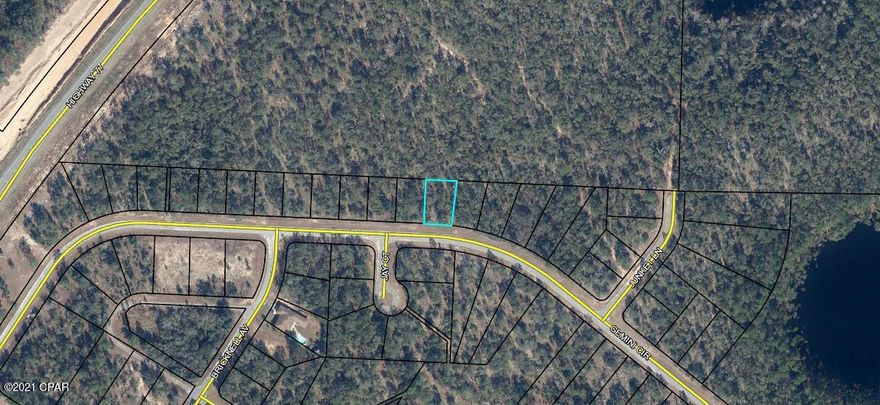 This just under a quarter acre lot is located within the popular Sunny Hills Community which has a golf course, recreational park and also is home to Boat Lake Swim Park(see photos). The area also has numerous other spring fed lakes. It is less than an hour drive from Panama City Beach. The visual depiction of the property lines on photos are not exact.