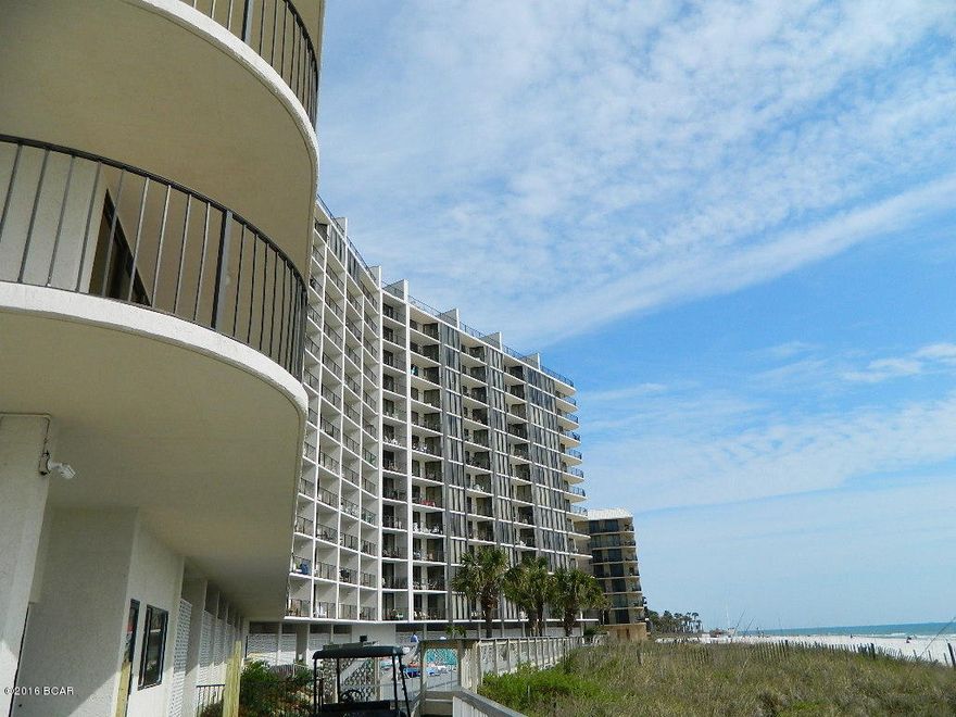 Penthouse with Two Gulf-Front Bedrooms! Turn-Key Condo For Sale at popular Edgewater Beach Resort. Beautifully renovated 2-story. Fully Furnished. Open living room with balcony. Gulf-Front Master Suite features floor-to-ceiling windows, en suite bath with tile shower, balcony access. Fun spiral staircase leads to a secluded sleeping loft with wet bar, bath and incredible 600sf roof-top deck! New Washer/Dryer 2015, AC/Water Heater 2014. This condo sleeps 7. 2015 Rental Income $37,327. Gated, Building-Side Parking, Golf Club, Tennis, Basketball, Gym. Kids Club. Lagoon Pools, Hot Tubs, Splash Pad, Sun Decks. Restaurant & Bar, Market, Pizza. Owner's Pets ok. Onsite Tram. Walkable to dining, shopping, entertainment. Trolley to Pier Park. Come find the Coastal Lifestyle of your dreams!