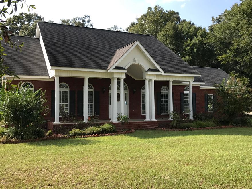 Beautiful 3 Bedroom 3 Bath home on 37.7 acres!  This is a stunning split floor plan home with tons of natural light.  If you want an up-to-date kitchen this home has it!  Want a relaxing and show ready front porch, this home has it! The vaulted ceilings thru-out the home gives it a very spacious feel with French doors that open up to the back patio.   One of the additional bedrooms has its own private bath.  Many other features of the home include new kitchen appliances, a large master bedroom and bath with separate garden tub and shower, formal dining room that could function as an office if needed, large foyer, laundry room with plenty of storage, security system and a double car garage.  Several large hard wood trees are scattered throughout the property making it a deer hunter’s dream! Approx. 18 acres of planted grass could be used for horses.  Picture yourself sitting on the back porch enjoying the fireflies and don't hesitate to make an appointment to see all this property has to offer!
