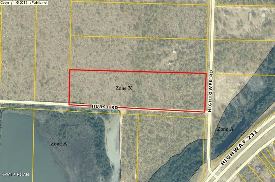 Wooded acreage on paved road just off Hwy 231. 30 min drive to Panama City to beaches. Corner location with many building sites to choose from. Property appears to be high and dry. Nice oak and pine trees throughout the property. Property has been surveyed.