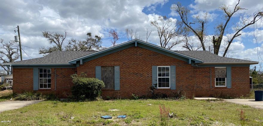 Duplex with 2 bedrooms and 1 bathroom on each side.  Corner lot with a brick structure. Drywall cut four feet up, good bones, new roof, great investment property.  Quick turn to generate revenue. Seller already has rental interest. Ready to close. CASH ONLY