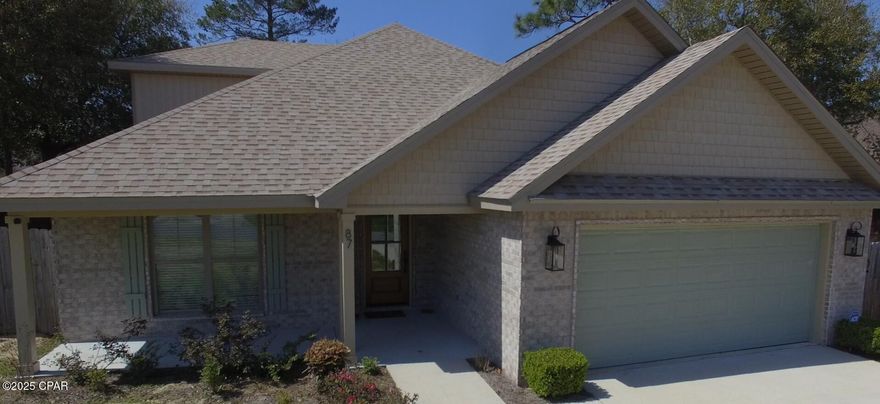 **Assumable VA loan at 3.9%.** **Professional Photos Coming**
Welcome to your new home in beautiful Magnolia Lakes of DeFuniak Springs! This 2019 built 4-bedroom, 3-bathroom brick craftsman is designed for modern living with an inviting open floor plan that seamlessly blends style and functionality. As you step inside, you'll be greeted by a mahogany farm house door which opens into a spacious entry hall and living area that flows effortlessly into the dining and kitchen spaces. The kitchen boasts elegant granite countertops, perfect for both cooking and entertaining. All stainless appliances will remain with the home. There are two large additional bedrooms, each with walk in closets, that share a bath located in their own private wing of the first floor. There is a large, centrally located laundry room on level one. The large primary suite is a true retreat, featuring a luxurious attached bathroom with dual vanities and a soaking tub, along with his and her walk-in closets for ample storage. Head upstairs to discover a versatile large bedroom that can also serve as a media room, complete with an attached full bath. A cozy office nook at the top of the stairwell provides a perfect space for work or study. The second floor is a perfect private guest quarters or teen refuge. The garage is sized for two cars and has a glossy epoxy finish. There is also a large storage closet in the garage as well as floored storage in the attic. Step out back and find a large, covered porch perfect to relax on and have an evening cocktail. Outside, enjoy the serene surroundings of the neighborhood, which includes a private lake with a pier for fishing and a charming pavilion for outdoor activities. Don't miss this opportunity to make this well maintained family home yours!