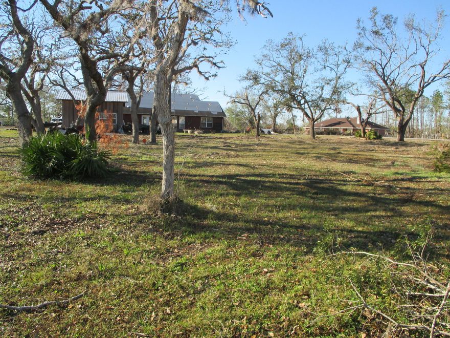 ''CURRENTLY UNDER CONTRACT, SELLER ACCEPTING BACKUP OFFERS''  All brick 3 bedroom, 2 bath home in a wonderful  neighborhood with a great view of Deer Point Lake.  The home has a private office, trey ceilings, a large laundry room and a very spacious family room.    It also has no carpet making it perfect for pets.  The neighborhood is golf cart friendly and the single access street makes it a safe and quiet place to raise a family.  The large lot offers plenty of space to park your toys, camper, boats, etc. and the seller just added a detached 20' x 24' workshop.  The home received very little hurricane damage and can be occupied immediately upon closing.  The owners are in the process of completing the storm damage repairs.    Call now to schedule an appointment to see this home.