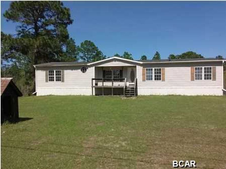 Investors this is for you this mobile home is a short distance to the beaches, schools and shopping, yet country living at it best. Needs work but for the price can't be beat, this is a 3 bedroom 2 bath this is a must see. Being Sold as is.
