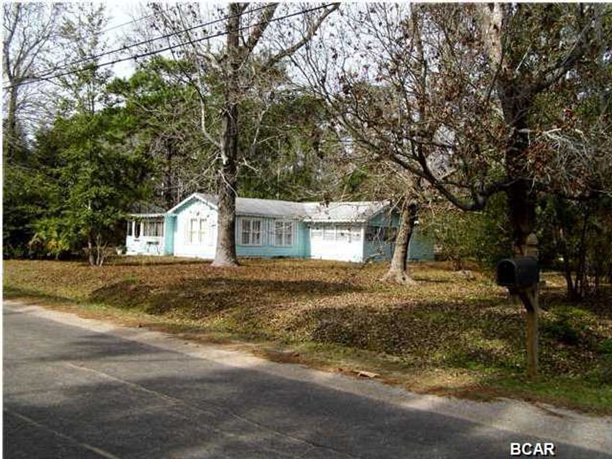 Charming home on a spacious lot. Home needs TLC, but it has loads of possibilities. Home being sold in its AS IS condition.