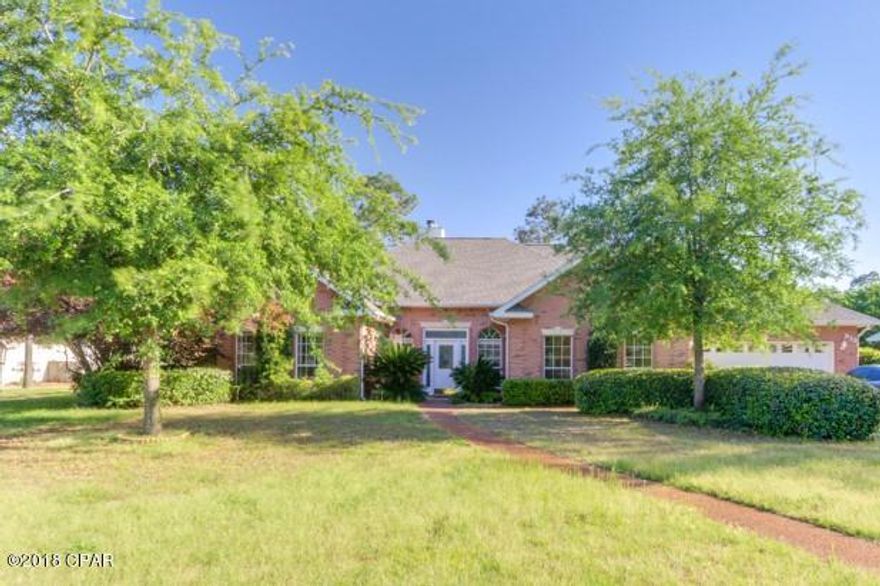 Almost $100,000 less than any other 4 bedroom home in Lynn Haven with a pool! Living is easy in this impressive, generously spacious residence in the much desirable Mill Bayou. This 4 bedroom 3 bathroom home boasts just over 2,900 sq ft of heated and cooled space. Conveniently located close to great schools, shopping and popular dining. Highlights include a two car garage, in-ground pool, screened back patio, wood flooring throughout the living areas, crown molding and an elegant fireplace. Other features include a new roof and hot water heater installed 1 year ago, HVAC installed 5 years ago and the pool pump installed 3 years ago. The magnificent kitchen which opens to the great room features granite countertops, a large island, tons of cabinet space and a huge breakfast bar. Enjoy gatherings by the fireplace in your generously sized great room. French doors separate the dining room and kitchen creating an elegant environment for entertaining family get-togethers. The large master bedroom provides plenty of comfortable living space and a private master bath which features a double vanity, tiled shower and a jacuzzi tub. The additional bedroom provides an exceptional amount of storage from large closet space to built-in bookshelves. Relax in the sun room over looking the large back yard while the kids play in the in-ground pool or enjoy an evening stroll though the friendly neighborhood. You don't want to miss your opportunity to own this beautiful home in a great community.