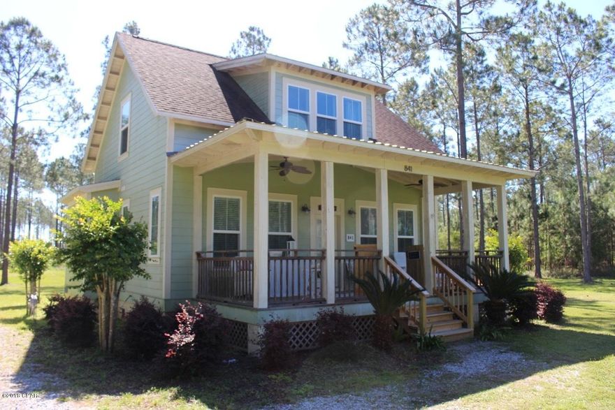 ONLY 10 MILES TO MEXICO BEACH! Fishing ponds, wildlife, boat ramp to Wetappo w/ access to Gulf Of Mexico. Custom built 3 bedroom 2.5 bath home has bottom level master suite, large open floor plan will allow for easy entertaining. Bonus room could be used as playroom, den, florida room; you decide! The oversized lot gives you all the elbow room you need and plenty of room for a barn, garage, and or pool. The home features custom cabinetry and granite counters in kitchen, hurricane impact windows, hardwood floors throughout living areas, marble tile floor in baths, tons of natural light, and plenty of closet space. Dual HVAC system, alarm system, well water filtration gas removal system, new pump house, irrigation system. Did I mention the quiet, peaceful see every star in the sky nights? Co