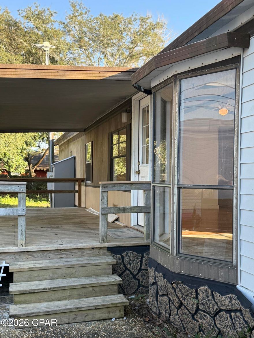 Opportunity awaits just blocks from the beach! This 2 bedroom mobile home has been completely gutted, partially renovated, including vinyl siding with new plywood. Spacious 50x120 lot with access to sewer & gas, this property offers flexibility. Whether you are looking for an affordable beach getaway, rental investment, or future new construction site, this property delivers incredible potential just blocks away from the beach. There is a dedicated beach access and VOLUNTARY $50 annual HOA fee.