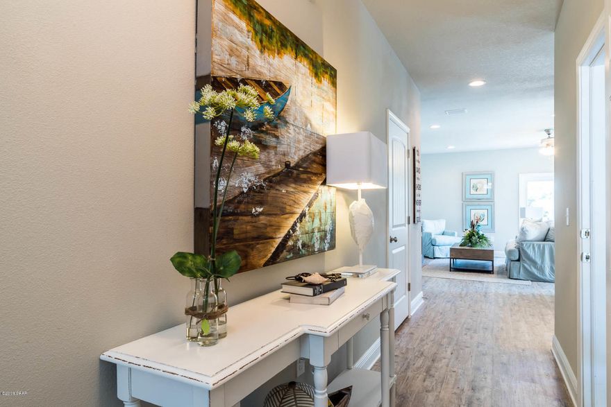 Newly constructed townhome close to those turquoise waters and sugar beaches! This interior townhome offers 9' ceilings downstairs and 8' ceilings upstairs with Ivory cabinets, Luna Pearl granite, and luxury vinyl plank flooring. An open and spacious floorplan with a huge master suite upstairs with a large walk-in closet and gorgeous master bath with high double sink vanity.