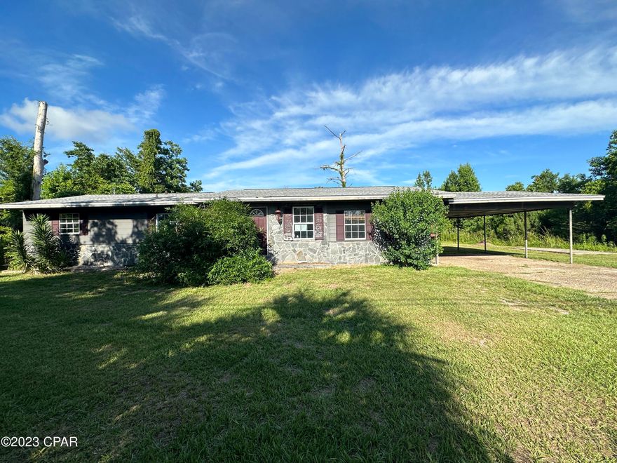 Ranch styled home situated on a large lot close to Tyndall AFB..  This home is a fixer upper offereing an empty canvass awating your sweat equity to bring maxium value and utility to fit your needs. The house has a large bonus room aside from the three bedrooms that could be a 4th bedroom or family room. Property is sold strickly AS-IS.