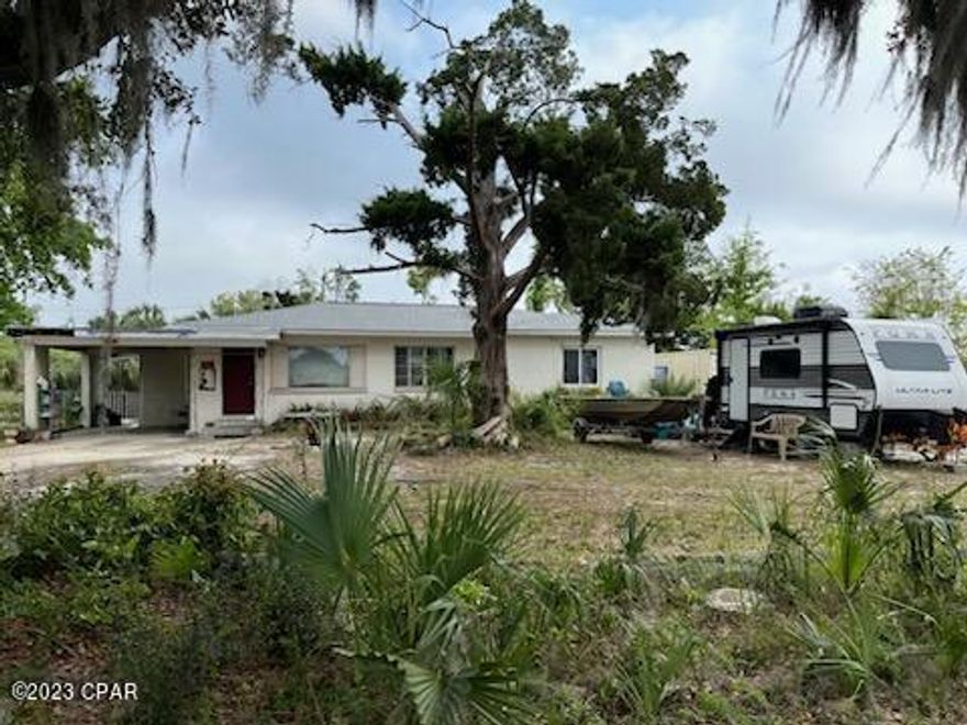 Investor Alert!!Ready to sell! Fixer Upper!!  Property was damaged from the hurricane and here is your chance to bring this home back to its original beauty.  Situated in the desirable Garden Club district, this home features: three bedrooms, one bath, kitchen, living room, etc. It is situated on a 0.495 acre lot.  It has beautiful established trees that survived the storm and is conveniently located near Panama City with restaurants, shopping and seasonal events nearby.  Bay Memorial Park and the Panama City Garden Club are situated just north of the property.  St. Andrews Bay is situated to the South.