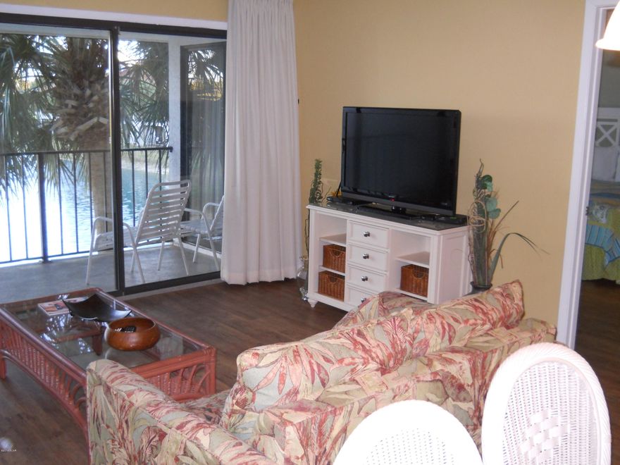 PRICE REDUCTION! MOTIVATED SELLER! Seller says to bring all offers! Top floor Gulf Villa unit with an excellent view! Unit has updates including wood flooring, custom drapes, new bedding and furniture. Also a new A/C compressor and air handler. This 2 bedroom unit is a part of the Edgewater Beach Resort which includes amenities like tennis courts, 11 pools, basketball courts and Beach side Restaurant.