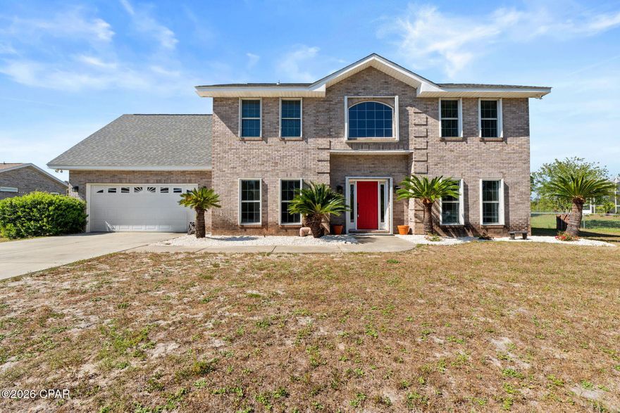 This custom-built, all-brick two-story home offering over 2,800 square feet of living space, featuring 4 bedrooms, 3 bathrooms, and situated on more than three-quarters of an acre.

As you step inside, you're greeted by soaring 20-foot ceilings that create an impressive sense of space and natural light throughout the main living areas. The updated kitchen is designed for both style and function, featuring granite countertops, stainless steel appliances, and an open layout that flows seamlessly into the great room and breakfast nook, making it perfect for everyday living and entertaining.

The home also offers a separate living room with a cozy fireplace, providing a warm and inviting space to relax. The first-floor primary suite serves as a private retreat and includes a beautifully updated bathroom, while updated flooring throughout the home adds a modern touch.

Outside, the property continues to impress with a large shop with electricity and a detached garage, offering plenty of space for hobbies, storage, or a workshop.

With its spacious layout, quality construction, and expansive lot, this home offers the perfect combination of comfort, functionality, and room to grow.