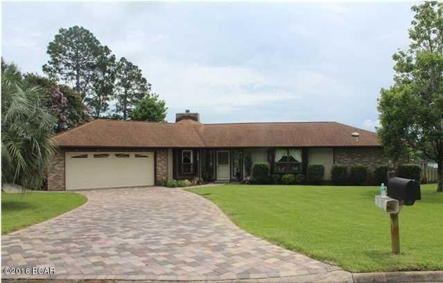 Lovely waterfront home on Callaway Bayou with boat access to St. Andrews Bay, Gulf of Mexico, and the Intra Coastal Waterway. This fabulous home has amazing panoramic views of Callaway Bayou. Enjoy the in ground screened-in pool while the pelicans and herons fly by. This wonderful home has been very well taken care of and offers so much. The kitchen has beautiful granite counter tops, the living room has high beamed ceilings with stone fireplace, the master bedroom is large and has water view, the driveway has brick pavers, the pool is screened-in, and the deck is just waiting for your Barbecue! The water view starts as soon as you  walk in the front door. You will be the envy of your family and friends! Just jump in your boat and take them over to Shell Island for a day at the beach! Age, SF Lot and Room Sizes approximate. Please verify if important.