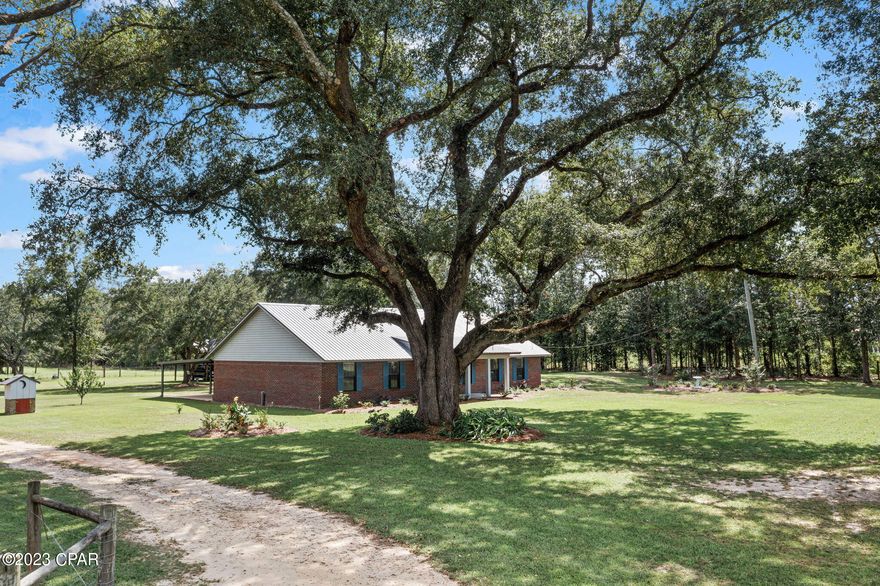 'CURRENTLY UNDER CONTRACT, SELLER WILL CONSIDER BACKUP OFFERS.  Rural, private, and serene 14.1 acre farm located just 30 miniutes from Dothan, Numerous updates made to this 3/2 Ranch style brick home including; metal roof, plumbing(PEX), LVP flooring, ceramic tile, and interior paint. The home is very spacious and has several oversized rooms and closets. Property has enormous majestic live oaks and recently upgraded landscaping to complement the tranquil country setting. The entire farm is fenced and cross fenced. It also has a private fish pond, running water to several paddocks, two pole barns (one with electric), and two separate storage/work sheds with electricity!! Owner says there are consistent sightings of deer and turkey here too! Make an appointment to take a look for yourself, this is a great opportunity for an amazing home!