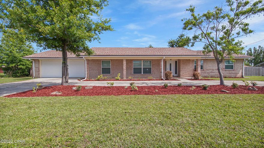 This ONE has everything you've been searching for, and more! A recently remodeled Ranch  sitting on a generous cul-de-sac Lot, in Prime Location! From the light brick exterior to the sky blue interior walls, this home will captivate you. The open floorplan covered in Luxury Vinyl Planks is sure to make you wonder in admiration of the stone covered fireplace, and right into the granite countertop kitchen, featuring all new Stainless Steel Appliances. Quickly you will notice the abundant Natural Lighting coming in from all directions and look up at the Vaulted Ceiling felling safe under the newer (2020) Roof, while you feel the cool air blowing from the also newer (2020) AC. But don't let the comforts of our modern world take away form a pleasant afternoon spent under the covered back porch