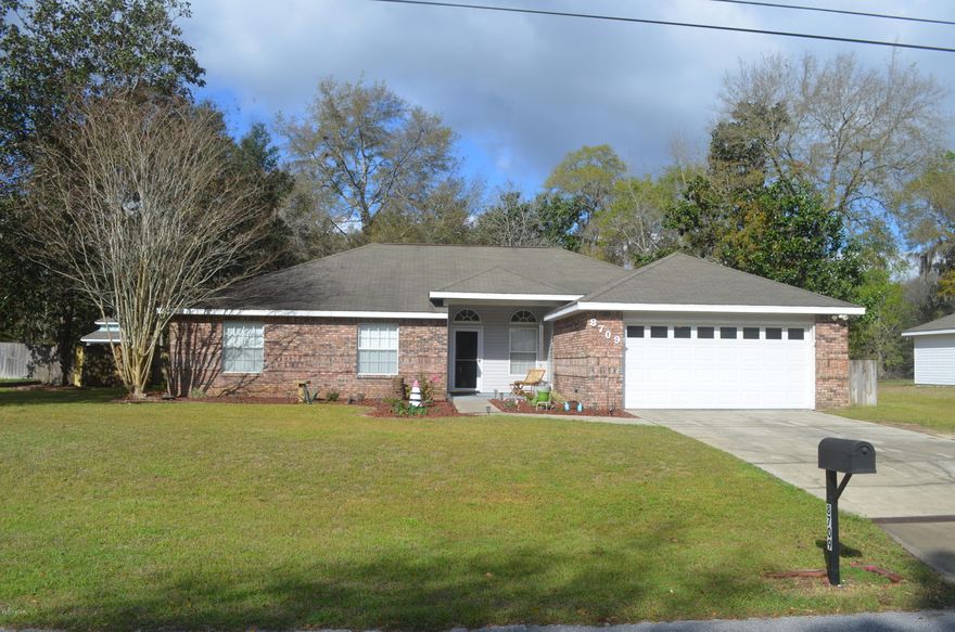 Immaculate 4 bed/2 bath home with dock on Indian Creek featuring a detached 24 X 24 workshop/2-car garage with concrete floor and 220 electricity in addition to your 2-car attached garage. The home has a split bedroom floor plan with tile, stained concrete and Pergo flooring. The kitchen has been updated with stainless steel appliances, granite countertop, and upgraded cabinets. New HVAC (2015) is very efficient, providing low energy bills. The yard is fenced with a screened porch and fire pit.  Located within a 1/2 mile to 2 public boat ramps on Deer Point Lake. Come see a little piece of country living that is a convenient drive to schools, Tyndall AFB and Panama City. Seller providing 1 year American Home Shield Essential Warranty. All information is approx. and must be verify by buyer.