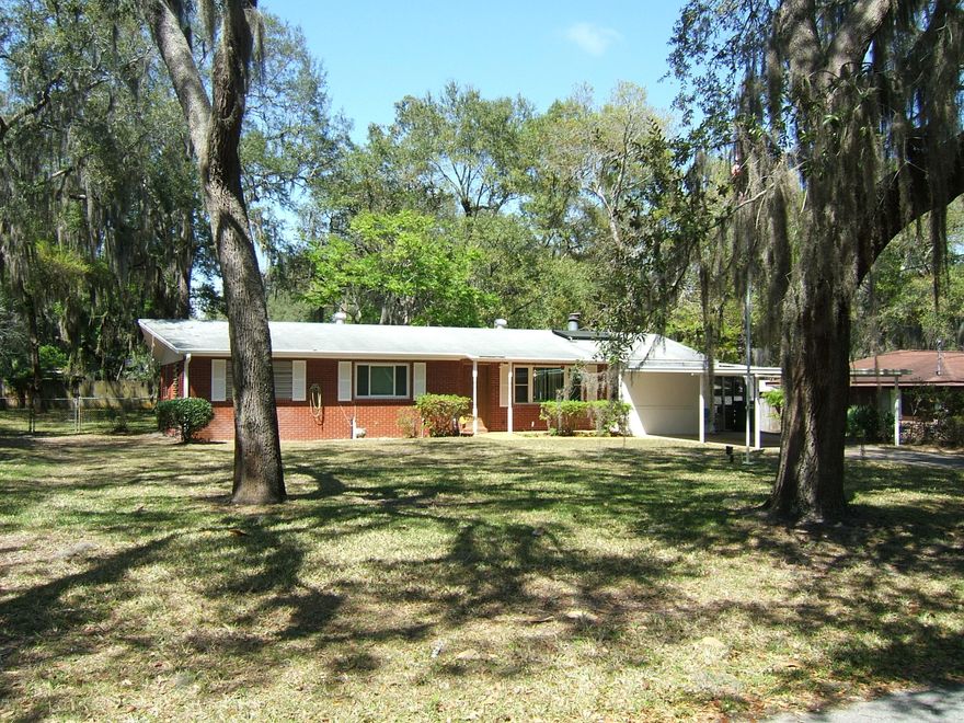 Quaint home located in the moss draped Donaldson Point community. Large lot with mature trees and manicured lawn ready for a family. Home is well maintained 3 bedroom 2 bath that is move in ready. Windows replaced 2017 with vinyl windows with bolt on shutters for protection. Water heating is electric with solar assist. Warm den with pine log stone fireplace is in the converted garage. Home Inspection completed 4/6/2017 for the purpose identifying any repairs before you have viewed the home. Refrigerator and freezer in kitchen