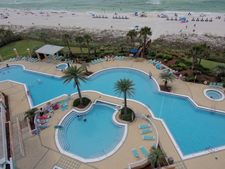 END UNIT, WEST BUILDING, NEW A/C 

Gulf front Master Bedroom.

En Soleil unit 821 has a spectacular view that overlooks the pool area. As for the amenities, guests and owners enjoy 6,500 square feet of gulf front pools, two hot tubs, two grand waterfalls and two waterfall fountains. En Soleil staffs 24-hour security personnel and guarded gates. Assigned  Garage Parking spot #5. Additional outdoor parking is available for family and friends. This condo has been a NON RENTAL and offers 2,316 square feet of livable space to enjoy! A few of the numerous highlights of this unit include: NEW REFRIGERATER, New Hot Water Heater, granite countertops, stainless steel appliances, open kitchen/dining/living concept, gas fireplace, A Huge 500 square foot balcony with a NEW GRILL overlooking the Gulf.