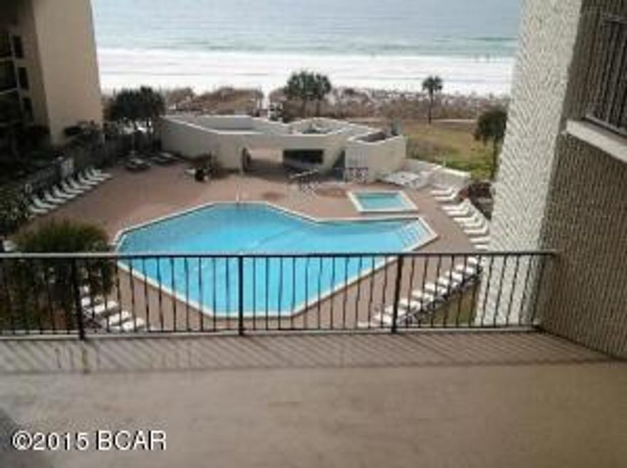 This is a great fully furnished remodeled unit within a beachfront complex. It is one of the nicer units within Top of the Gulf. This complex features a large pool, kiddie pool, an elevated sun deck, snack bar, exercise room, and sits right on the worlds most beautiful beaches. Come take a look at this unit while it last. (all information approximate, if important please verify)