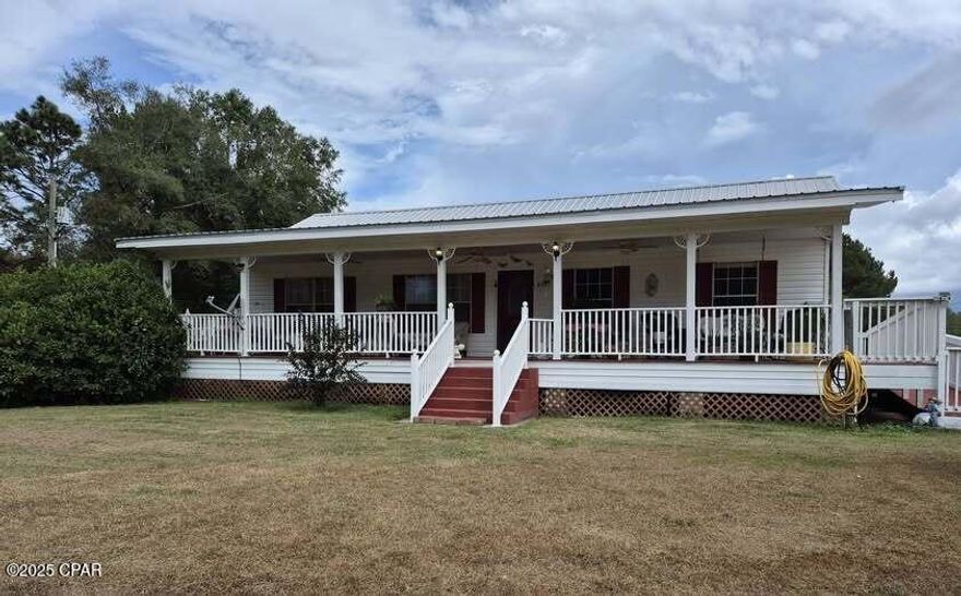 THIS is the property you have been looking for !!  40 acres of unrestricted land away from the hustle and bustle of city life.  There is a large, fenced 19-acre pasture, a great little pond , and even a nice chicken coop. The beautiful, custom-built 2-bedroom, 2 full bath home has been well-maintained and is ready to move into.  Home has 1344 heated/cooled square feet and 2304 total square feet. Enjoy the country life and abundant wildlife from the covered front and back porches (both are 10x48) that run the length of the home. Home comes with a beautifully designed kitchen that has a stainless steel refrigerator, stove with double-ovens, and plenty of cabinet space. The roomy master suite has an adjoining bathroom with a large jet/soaking tub, separate shower and lots of storage. As you walk out onto the back porch, let the ducks out of the chicken coop, and take a stroll down to the pond to watch them swim.  There is an enclosed area on the back porch with shelves that provide a lot of extra storage.  Property features a huge 4-stall pole barn/carport and an additional shed for storage. The front porch provides a handicap ramp with accessible entry door.  Some of the custom features include beautiful hardwood flooring, 2x6 outside walls, double insulation in the attic and under the house, and a double foundation.  Metal roof is only 3 years old.  There is a Dollar General a few minutes from the property and it is 15 minutes to Geneva, AL, 20 minutes to Bonifay, FL, 1 hour-15 minutes to Panama City Beaches, and 50 minutes to Dothan, AL.  A true Paradise in the Country !!