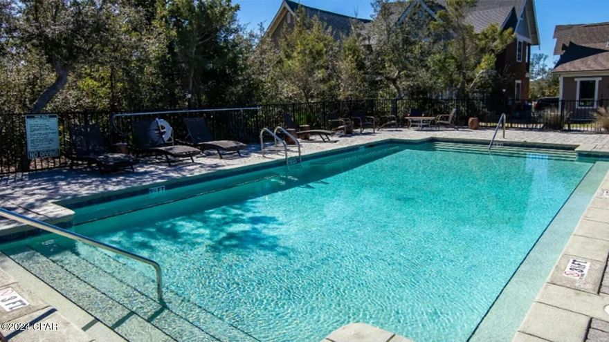 Prime Residential Vacant Lot in Sanctuary Beach ready for your new custom dream house! Gated subdivision, not in a flood zone (Flood Zone X), half a block from the community pool, and in the most beautiful neighborhood in Bay County! Watch deer walking through your back yard. Secluded property, underground utilities, low association fees. Sits on Legends Golf Course. Close to shopping, marinas, the Bay, golf courses, Bay Point Golf Club, plenty of restaurants, entertainment, and minutes from the Gulf of Mexico. $175 New Buyer fee includes Capital Contribution Fee and Transfer fee per lot. Building restrictions have been lowered to make it easy to build.