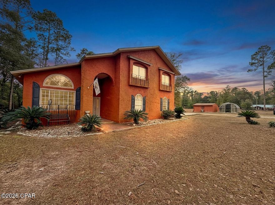 Tucked behind gates on 3 fully fenced acres, this one-of-a-kind 5 bedroom, 3 bath property offers privacy, space, and versatility rarely found. The main living areas impress with 23-foot vaulted ceilings, a gas fireplace, granite countertops, and an abundance of cabinetry, creating a warm yet grand atmosphere perfect for everyday living or entertaining.

The downstairs layout features two bedrooms and two full bathrooms, along with a huge laundry room that easily doubles as a hobby or flex space. Upstairs, you'll find a thoughtfully designed office with its own exterior entrance and private covered deck, ideal for a home business or quiet retreat. Three additional bedrooms, a full bath, and an extra landing area provide plenty of room for family, guests, or recreation.

Outside is where this property truly shines. In addition to three sheds and a greenhouse, there's a large enclosed workshop currently set up as a professional dog breeding facility, complete with interior kennels, whelping room, grooming room, and front office—a rare and valuable feature that offers endless possibilities for business, hobbies, or storage.

Surrounded by nature and total privacy, the expansive back patio and firepit create the perfect setting to unwind and enjoy peaceful evenings. This is more than a home—it's a private estate designed for living, working, and enjoying the outdoors on your own terms.