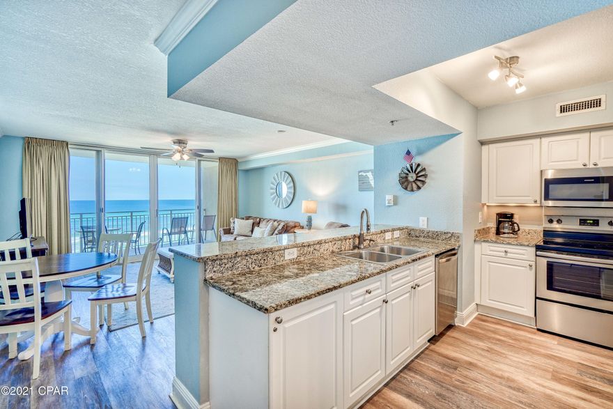 This is the condo you have been waiting for! Emerald Beach Resort 426 is a LOW floor, upgraded condo and is priced to sell! The kitchen has brand new stainless appliances. The unit has been repainted and all the carpet has been removed. It has luxury vinyl plank floors throughout most of the condo. The bathroom has been upgraded with a new vanity and new tile. The condo has upgraded lighting fixtures throughout. Also, the HVAC is BRAND NEW! This condo checks all the boxes and is being sold fully furnished and turn key! Emerald Beach Resort is a well maintained building on the west end of Panama City Beach. It offers a lot of amenities including two large pools (a zero entry pools with water play area), a Gulf front tiki bar, Sky Bar, a large fitness center, gift shop, Starbucks, covered parking and more! Emerald Beach Resort has a great location close to Pier Park and lots of restaurants and shops!