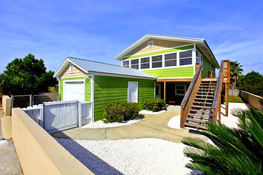 This 2 bedroom, 2 bathroom unit is the upper story of a duplex home and comes fully furnished. The Florida room offers seating with views of Thomas Drive and plenty of space for all your beach gear. The dining area has seating for 6 and 2 more at the breakfast bar. The master bedroom has a queen size bed, adjoining private bathroom, and access to the balcony. The guest bedroom has a bunk bed. Stacked washer and dryer included. Guests of the upper and lower units share a fenced backyard. Beach access is located 0.2 miles away at Rick Seltzer Park. Pets negotiable with $250 non-refundable pet fee/pet. All utilities included. Only 6 month lease term available.