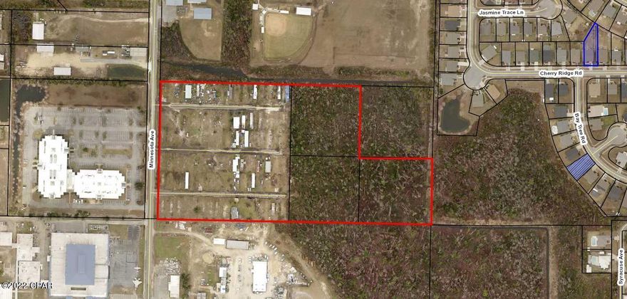 Mobile Home Park for sale. This sale consists of 4 parcels. The front 10 acre parcel has 86 lots, and is in the Lynn Haven city limits.  All lots are on separate water meters (80+ tap fees paid?) and city sewer, and there's a city-maintained lift station already in place. No wells or septic tanks. The back 7.5 acres (3 parcels) are in the county, were never developed, and have some wetlands that may be mitigated. All occupied homes still on site are on month-to-month rentals with no leases. For you developers, the city will also allow a HIGH DENSITY zoning of 15 units/acre for a MULTI-FAMILY development (possible 125 townhomes mol). OWNER FINANCING AVAILABLE WITH ACCEPTABLE DOWN AND TERMS. All meas. approx.