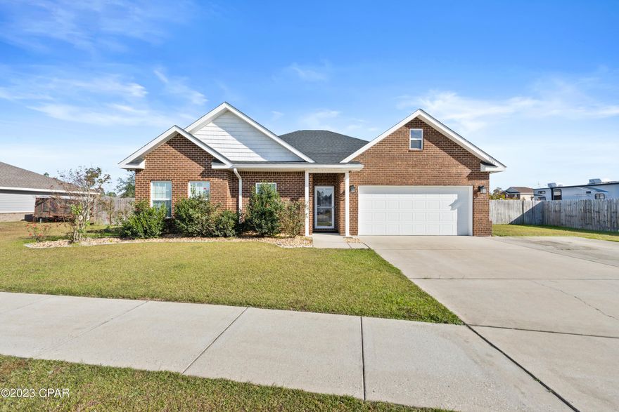 Check out this beautiful 4 bedroom, 2 bath, + Office home with a large lot in the Magnolia HIlls Subdivision. Magnolia Hills is conveniently located just off of Hwy 231 and Transmitter Rd. The exterior of this home offers brick and hardiboard siding, a sprinkler system with well, so no outrageous water bills while maintaining the yard, a 2 car garage with epoxy coated floor, plenty of space to park your RV or Boat or put in a pool, garden, or workshop in the privacy fenced back yard and a great covered patio for afternoon lounging. There is also wiring run to the back yard for a workshop or shed. This is one of the few newer homes with a large lot currently on the market. The interior of the home offers a great open, split bedroom floor plan with lots of closets and storage space. In the kitchen you will find a nice size pantry, granite countertops, stainless steel appliances and a large island giving you tons of counter space that overlooks the living room. The master bedroom is HUGE with its own ensuite bath with double vanity sinks, large walk in closet, and walk in shower. There are 3 additional bedrooms on 1 side of the home that are all good sizes and a 4th room on the other side of the home that makes for a great home office. If you are looking for lots of storage space, living space, on a large lot, then this is the home for you. Call your Realtor today.