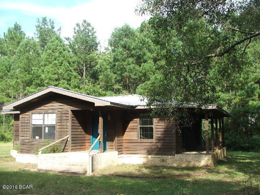 * PRICE REDUCED * This is a cedar lap sided home on 1.34 acres just north of town. The livng/dining and kitchen is all one large open area. There are wood laminate floors throughout. The house has a nice open side porch to sit and enjoy the peaceful setting. The house appears to have had some recent updates.