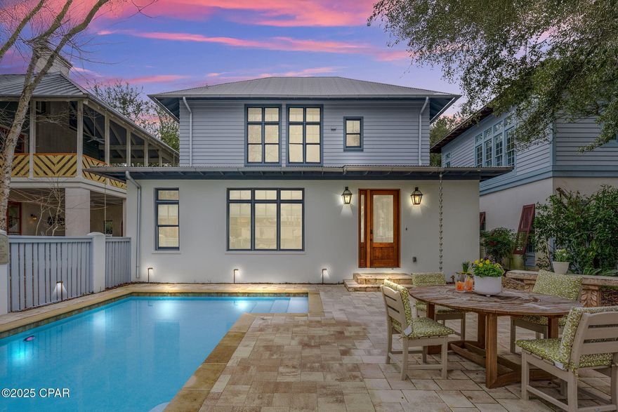 This charming 'Costa Verde Cottage' is a premier coastal retreat in the heart of Rosemary Beach just a short stroll to 6 beach access points;  offering a spacious and well thought out floor plan. This 2,232 sq. ft. home features four beautifully designed first floor bedrooms, including two master suites, and 4.5 baths, making it ideal as a primary residence, second home, or vacation rental.  A true rarity in Rosemary Beach, the property boasts a private garden path leading to an open courtyard and a stunning spacious pool area.  The second floor is a great room with soaring wood ship lap ceilings and floor to ceiling windows with French doors that open onto a covered deep-eave balcony. Enjoy open views of Long Green Park and the renowned Rodrigue 'Blue Dog' sculpture from the privacy of the living, dining, and chef's open galleykitchen. The home has been refurnished and a complete full kitchen renovation in 2022/2023 including wrap-around quartz countertops, Viking appliances, and tiled back-splash. The first master suite boasts serene pool and garden views, plus a spa-like bath with a jetted tub and separate travertine and tumbled stone shower. A second master, a bunk room with four twin beds, and a queen guest room comfortably accommodates up to 10 guests with lots of privacy. The pool area offers coveted space with an outdoor gas grill, dining area, a firepit table, and a back gate to private parking for two vehicles.  Perfectly positioned for the ultimate Rosemary Beach experience, this home offers front-row access to the Rosemary weekly farmers' market, festivals and all that this charming area has to offer. Just a short walk from the town center and the sugar-white sands of the Gulf, Costa Verde Cottage provides effortless access to boutique shops, gourmet dining, and community events at East Long Green Park. This home generates a substantial annual rental income. Specific home details available upon request.