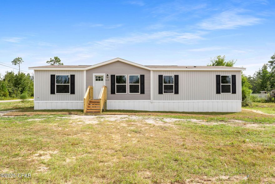 Welcome to 6420 Oakenshaw Drive - a brand-new 4 bedroom, 2 bathroom mobile home tucked away in the peaceful community of Youngstown, FL.

This home is move-in ready and designed with modern comfort in mind. Step inside to find a bright, open-concept living area with plenty of natural light and a seamless flow between the living room, dining space, and kitchen. The kitchen features sleek cabinetry, durable countertops, and brand-new appliances, making it the perfect space for both everyday meals and entertaining.

The primary suite offers a private retreat with a spacious bedroom and full ensuite bathroom. Two additional bedrooms provide flexibility for family, guests, or a home office. A second full bath ensures convenience for everyone.

Outside, the property offers room to relax, garden, or simply enjoy the quiet surroundings. Located just minutes from Panama City, shopping, schools, and outdoor recreation, this home strikes the perfect balance between country living and city access.

Whether you're a first-time buyer, looking to downsize, or seeking a rental investment, this brand-new mobile home delivers excellent value in a growing area.

Highlights:

Brand-new construction - never lived in

4 bedrooms | 2 bathrooms

Open-concept living, dining & kitchen

Energy-efficient features & new appliances

Peaceful Youngstown location with easy access to Panama City