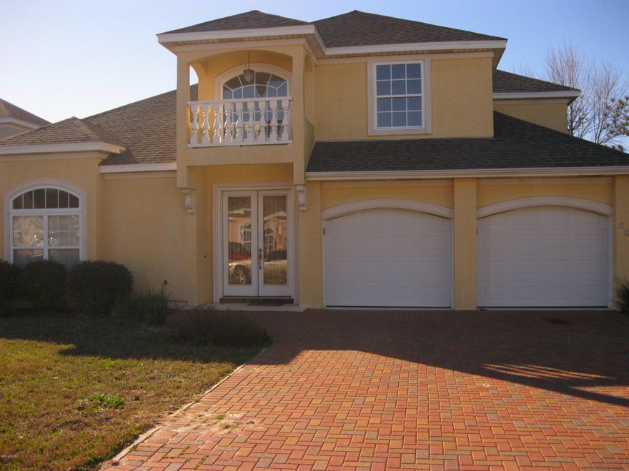 For rent. This luxury 2-story home is located in the desirable gated community, Tierra Verde at Hombre golf course. The luxury home is great for entertaining and families with an open floor plan, and screened in pool. The 4 bedroom, 2.5 bath home has a split bedroom plan with the master suite on the first level and three additional bedrooms on the second floor. There is a beautiful kitchen with granite counters, custom cabinetry and stainless appliances. The kitchen overlooks the breakfast bar opening into the living and dining areas. The spacious master bedroom has a beautiful bathroom with cultured marble, granite double vanities, and jetted tub. Washer/dryer hookup. Pets negotiable with $250 non-refundable pet fee/pet. This is an immaculate home located in the heart of Panama City Beach
