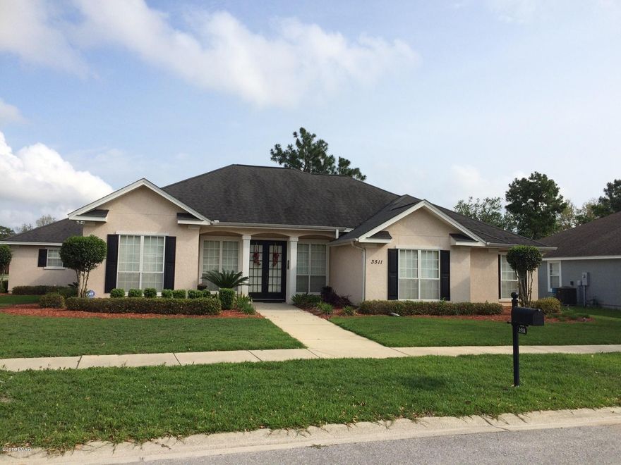 A fabulous four bedroom home in the exciting Hammocks subdivision can be yours. This gorgeous home features a living room with 12 foot ceiling, recessed lighting, gas fireplace and built-in bookcases. As you pass through the front door, you will be struck by this home's impressive display of windows and high ceilings, giving it an open and airy feeling. Your family will enjoy relaxing in the spacious living room, featuring a gas fireplace, as they watch their favorite movie. Surround sound was pre-wired at the time of construction and speaker drops were also placed in the master bedroom. The dining room featuring a high ceiling is elegantly appointed with wainscoting and a beautiful chandelier. The kitchen is everything you would expect it to be...solid surface counter tops, custom cabinetry and stainless steel appliances.  The master bedroom is spacious and is adjoined by a well appointed bathroom with double vanity, glass and tile shower, soaker tub, and huge walk-in closet.  The guest bedroom area offers three large guest rooms and a plush guest bathroom. Situated on a large corner lot with a very large backyard.  The subdivision is naturally and meticulously landscaped and offers a beautiful community pool and pavilion area for all residents to enjoy.  Beautiful home in a beautiful neighborhood awaits your approval.  Schedule your showing today because this home is priced to sell.