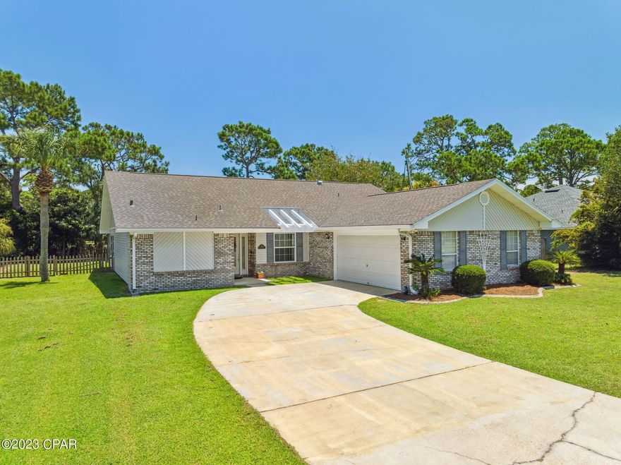 Welcome to your dream home in Panama City Beach! This stunning residence offers the perfect blend of spacious living and a golfer's paradise. Nestled on a serene golf course, this 3-bedroom, 2-bathroom home is a haven for those seeking comfort and convenience. 
     Step inside and be greeted by a spacious and inviting living area, adorned with tasteful finishes and an abundance of natural light. The open concept layout seamlessly connects the living room, dining area, and kitchen, creating an ideal space for both entertaining and everyday living. The well-appointed kitchen boasts modern appliances, and ample counter space.
     Retreat to the tranquil master bedroom, complete with new plush carpeting, large windows, two walk in closets, and an en-suite bathroom featuring a separate shower, and dual vanity sinks. The two additional bedrooms are generously sized, providing plenty of room for family, guests, or even a home office. 
      One of the highlights of this home is the bonus heated and cooled room, perfect for a home gym, hobby room, or additional living space to suit your needs. You'll also appreciate the convenience of the two-car garage, offering ample storage space for vehicles and outdoor equipment. In addition to the attached two-car garage, this property also features an additional 384 sq ft detached storage/garage with a ramp. This space is ideal for storing your golf carts, beach equipment, or any other recreational items you may have.
      Situated in a peaceful cul-de-sac, this property provides a sense of privacy and seclusion. Step outside onto the backyard patio, where you can soak in the breathtaking views of the lush green golf course while taking a dip in the pool or host unforgettable gatherings with friends and family.
     Beyond the beauty and comfort of this home, its location is truly exceptional. Panama City Beach is renowned for its pristine white sandy beaches, crystal-clear waters, and a plethora of outdoor activities. With this home's proximity to the golf course, you'll have the opportunity to tee off and enjoy a round of golf whenever you desire.
     Don't miss the chance to make this remarkable residence your own. Embrace the coastal lifestyle and start creating memories in this exquisite home on the golf course in Panama City Beach. This property was recently appraised at $480,000 so it is priced to sell!! Sellers are motivated! Schedule your private showing today!