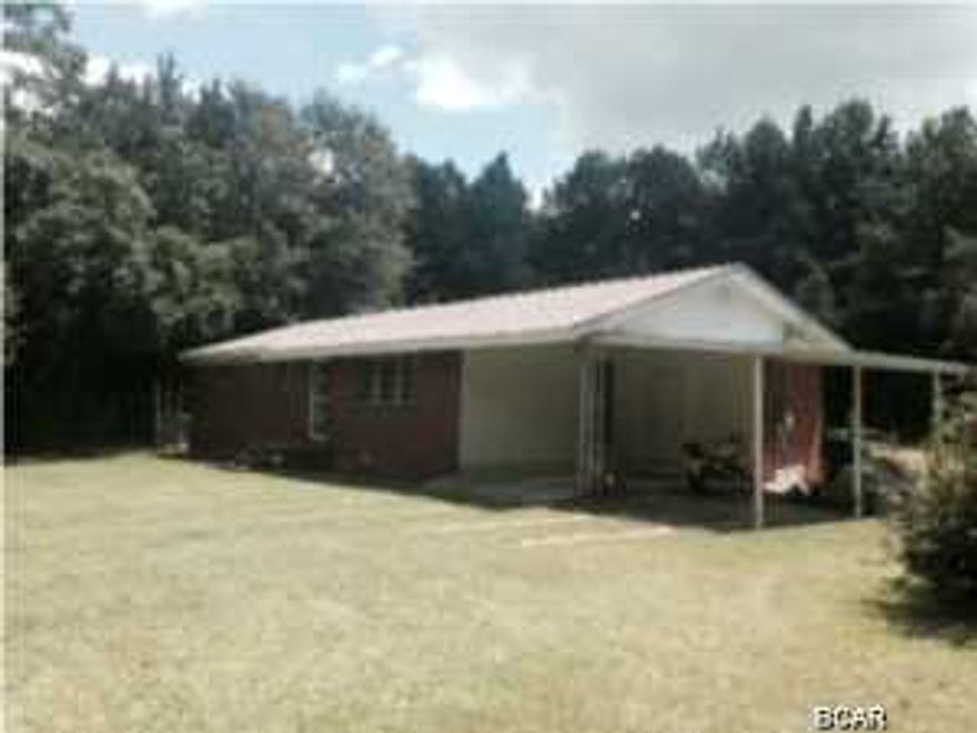 Nice country home with lots of privacy. Minutes from Chipley City Limits. This 3br/2ba brick ranch cutie has a open floor plan in livingroom and diningroom. Kitchen with pantry. Original hardwood floors can be found in most of home. Roof has been updated. Exterior includes covered patio, in ground pool, small storage building, some fencing, circular driveway and more.