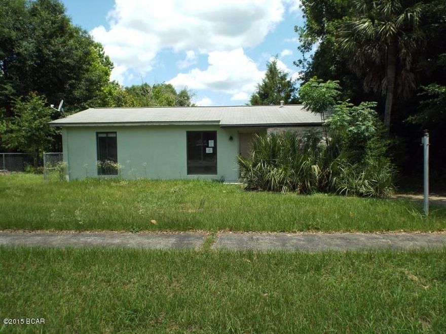 Two bedroom One bathroom home with back screened in porch in Sunny Hills offered as is.  The house is off the main road, the back is chain linked fenced and includes a 12x24 Shed in the back door.  All sizes are approximated or taken from other sources please verify accordingly.