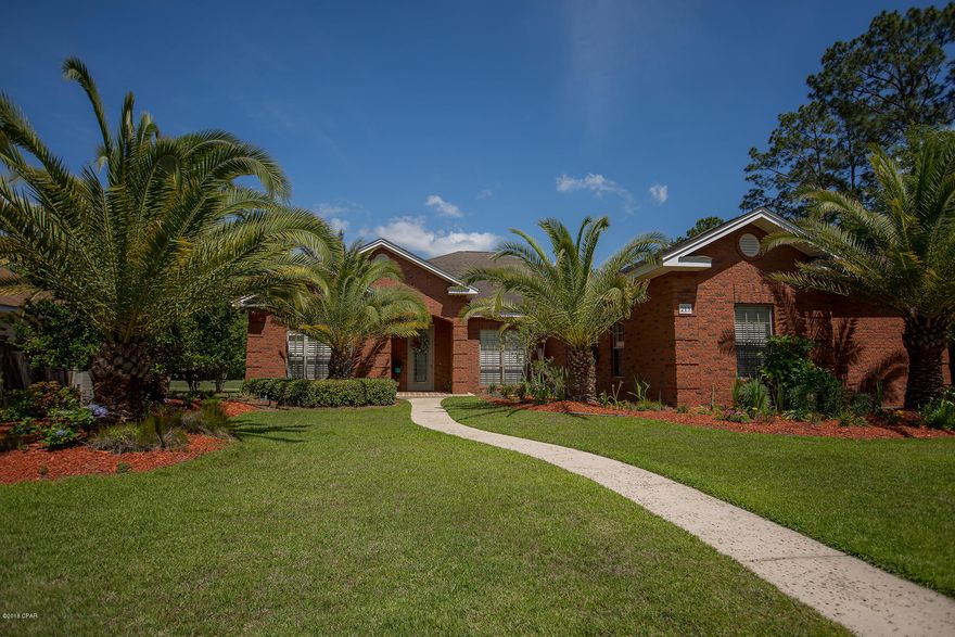 This lovely, custom built home in The Landings subdivision is a must see!  If you're looking for an all brick home with 4BR/4B and an open, split floor plan this one is for you!  This home offers 12/10 foot ceilings, crown molding, built-in shelving, an abundance of closet/storage space, granite countertops, gas fireplace, a beautiful in-ground pool with waterfall, and amazing sunrises over the golf course the property backs up to. This home also includes an oversized, three car garage. You will be welcomed with hardwood flooring, custom cabinetry, and a private bath and large closets for each bedroom. The master bath has a jacuzzi tub and two separate vanities along w his/her walk-in closets. This is a great lot on the golf course allowing privacy to enjoy the the beautiful view overlooking the pool and the golf course pond. The patio has custom pavers and both it and the pool are completely screened in. Just across the street, there is a community park.  Three times a year the neighborhood gets together for a picnic in the park with fun activities for everyone!  Don't miss out on this great home in a great community!  (All measurements approx; please verify if important.)