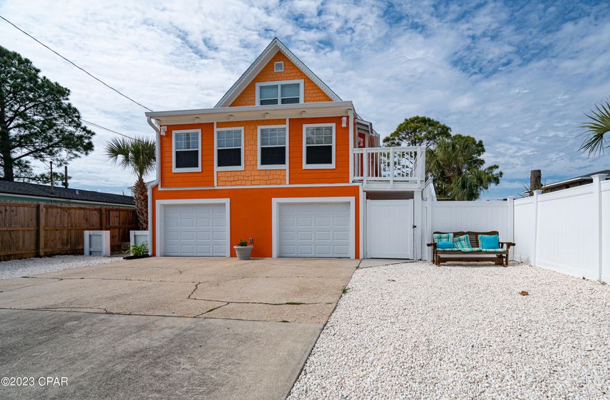 Sandwiched in between the Lagoon & the Beach. Rental Machine, this home has a separate mother in law apartment/carriage house.  Square footage is approximate 2509 sq ft.
    Turn key, fully furnished,Everything Stays!!! Owner has spared no expense on this  beautifully updated. Downstairs Carriage home/apt has complete Kitchen, Laundry, bedroom,Bath, Laundry, with entrance into yard. 
All rooms have fresh paint,LVP flooring, light Fully furnished bring your toothbrush. 
   There are hangout porches & patios for grilling or just to have those fun days & nights.
    The Lagoon is just across the street. The home is close to the public boat ramp. The Beach is a hop, skip & jump away. Your right in the middle of what feels like an island oasis.
      Drive the golf cart over or walk to The S. Richard Seltzer Park which provides public beach access, park is 4.75 acres on the beach. With a variety of restaurants and shopping nearby, and no high-rises on either side, you really feel like you have the whole beach to yourself.  
  Videos of both upstairs & downstairs attached.