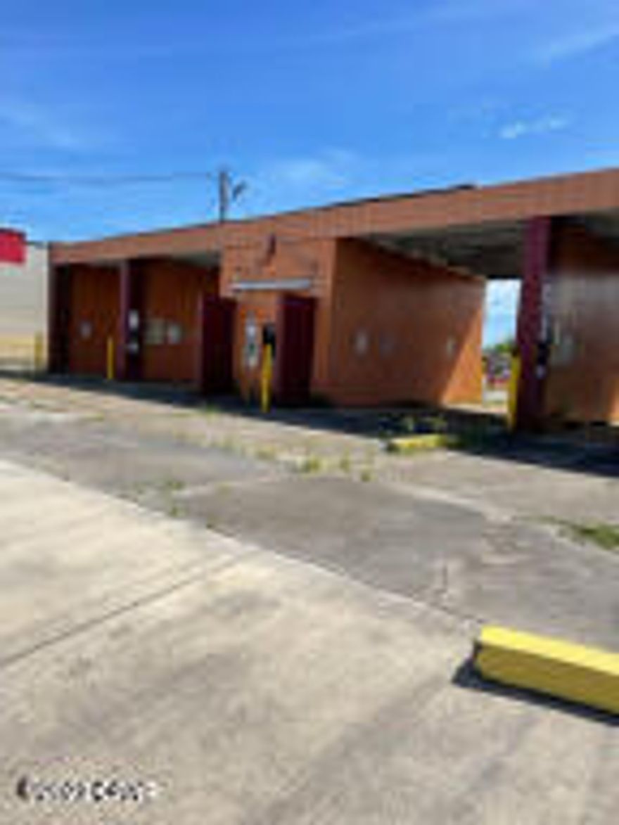 PRICE REDUCED. OWNER FINANACING WITH 25% DOWN. Nice lot with a concrete structure on it. There is an office in the center of 4 concrete structures that are open in each end. At this time cannot be used as a car wash.
Close to Tyndall AFB with steady traffic daily.