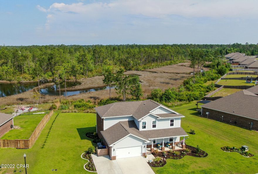 CURRENTLY UNDER CONTRACT, SELLER WILL CONSIDER BACKUP OFFERS. Stunning home in the waterfront neighborhood of Fanning Bayou w/a resort style community pool! Situated on a 1/2 acre lot, this home has amazing water views. As you walk in you'll immediately notice the windows overlooking the lush green back yard & bayou. The kitchen is a chefs dream & is open to the dining & living room. Kitchen features granite counter tops, island, large pantry & extra storage. There's also a half bathroom for guests, laundry room & the main bedroom all downstairs! The main bedroom is fit for a king! You'll love the size & amazing bathroom w/walk-in closet. Upstairs features a loft/living area, 4 nice size bedrooms & a full bathroom. You'll enjoy the view outside on your screened in patio.