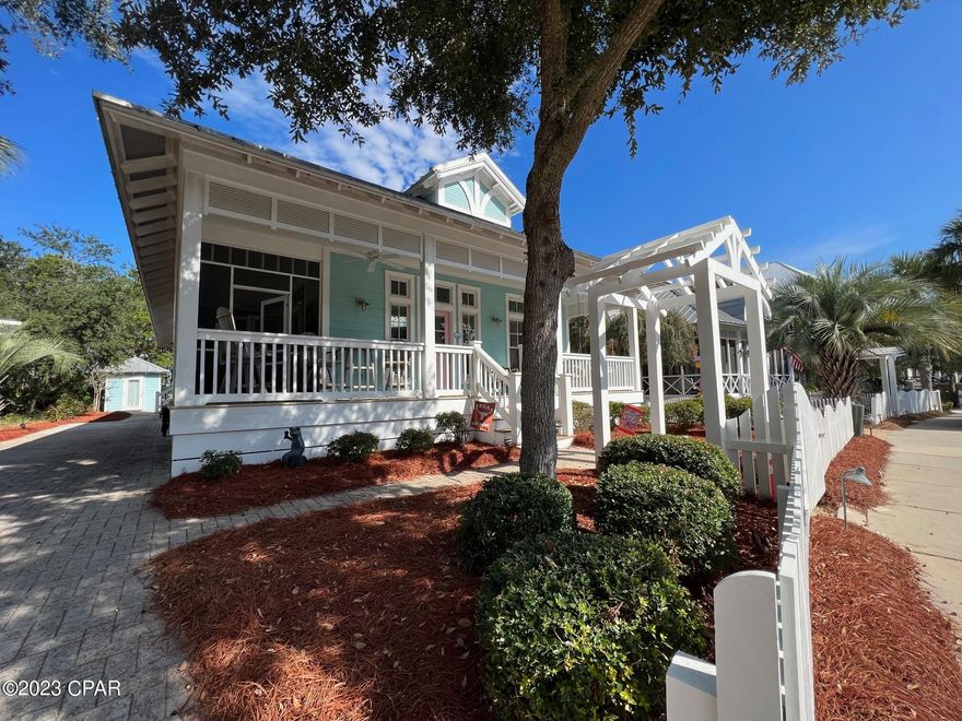 ''My Little Dream Cottage'' is a charming and quintessential 3 bedroom, 3 bathroom, one story beach house with a bunkroom and children's den, located in Carillon Beach. This custom designed home has an open floor plan, three sided wrap around porches and loads of upgrades, including tongue-in-groove ceilings, wainscoting, built-ins, transom windows, hardwood flooring, fireplace, granite counter tops, luxurious baths, custom closets and designer kitchen with island, breakfast bar and stainless steel, energy rated appliances. The screened in side porch faces the Bellview park and pool, and there is gas firepit in the backyard and a shed that has been converted into an office. The home is just a short stroll to the Beach!