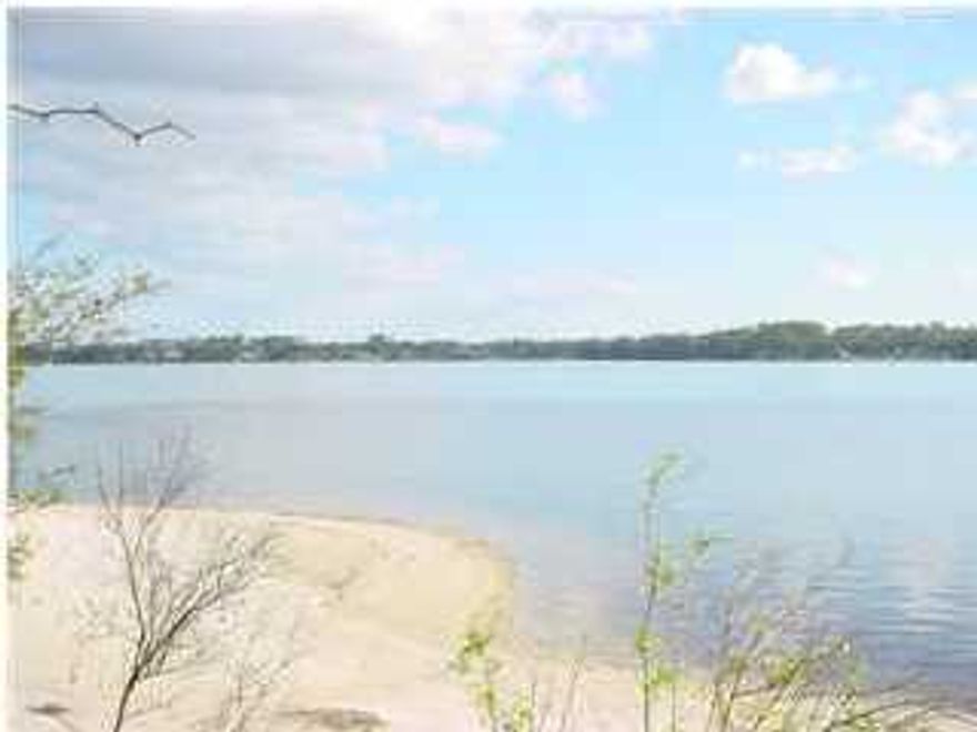 AGE,SF,LOT,RMSZ APPROX: Bay Front Lot in New Waterfront Single Family Development on North Bay(first waterfront lot on right). Beautiful permitted Bay Front lot in new waterfront subdivision. Home site, nature walk over and dock have been permitted by DEP, so you are ready to build! Deep water access. DEP permit has expired, but all paper work prepared for resubmitting.